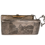 7. Women's Purse-Part of a dowery. Niello Silver from Van- depicts mother Armenia rising out of ashes, surrounded by Names of Armenian regions (provinces).